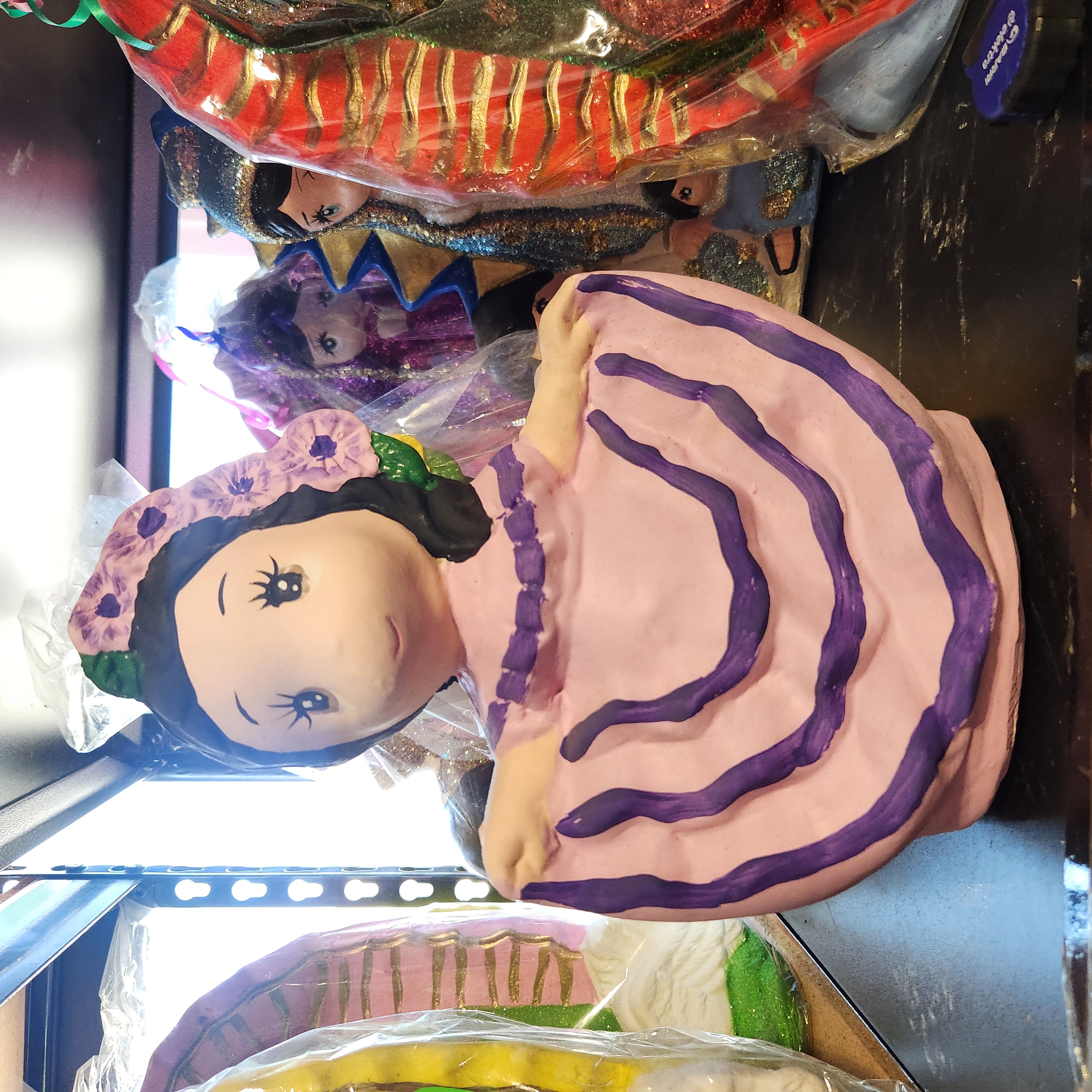 Muñeca alcancia bailarina