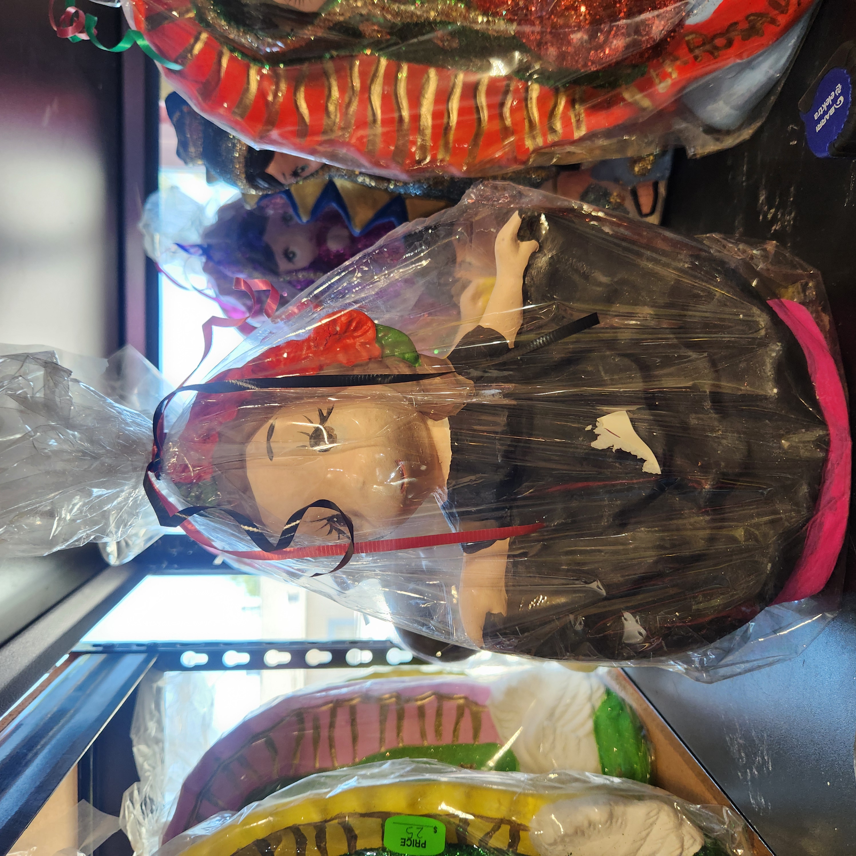 Muñeca alcancia bailarina