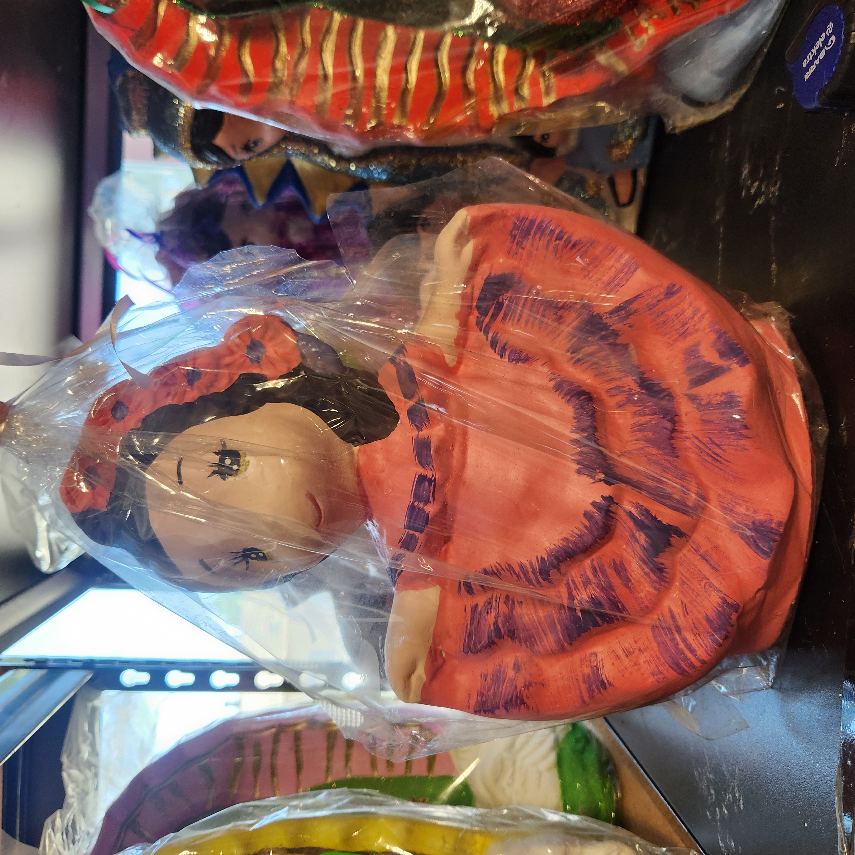 Muñeca alcancia bailarina